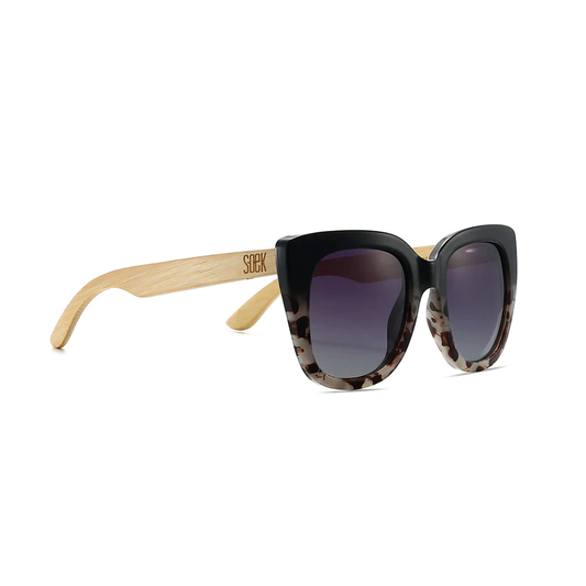 Oversized and dramatic, our Riviera sunglasses from SOEK in classic black topped with flattering ivory tort are the perfect statement sunglasses to suit all face shapes and sizes.&nbsp; Fitted with black gradient polarised lenses and white maple wood arms, this style knows how to up your glamour game.