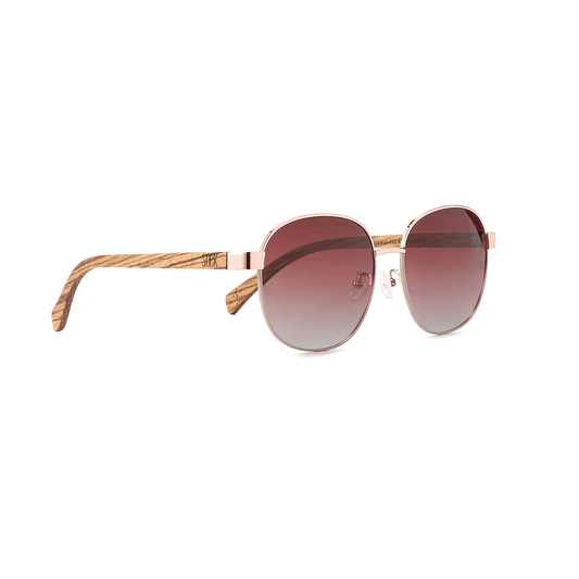 Reminiscent of old Hollywood glamour, our Cleo sunglasses from Australian brand Soek have an oversized yet delicate rose gold frame with blush accents. Designed to suit all face shapes and sizes.