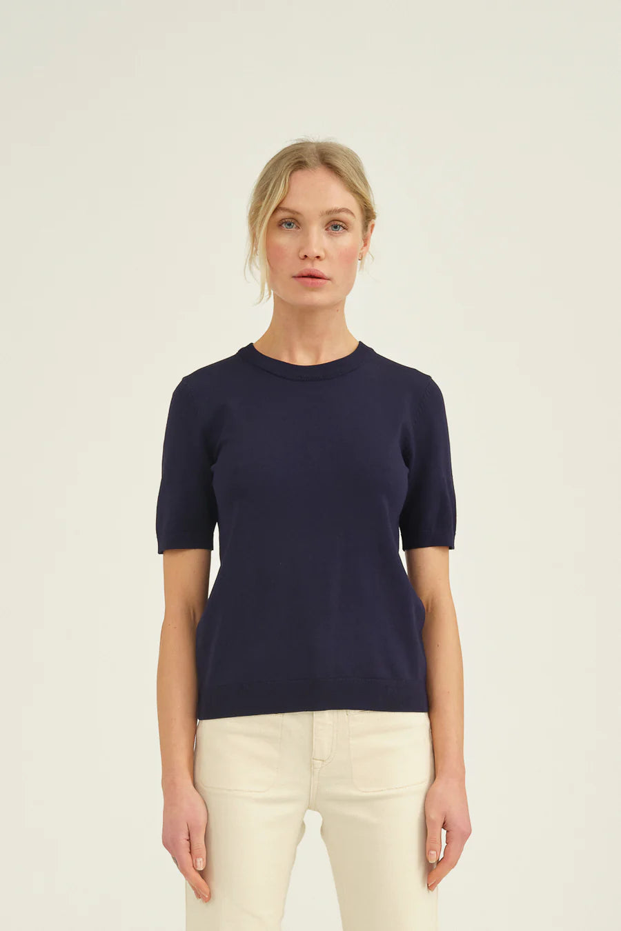 Eba Short sleeved Knit from our fabulous new brand Pieszac&nbsp;in a white knitted quality. Designed with short sleeves, O neckline and ribbing at hem. A great piece for transition into spring and for layering under jackets.