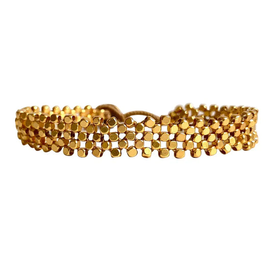 Fine openwork bracelet with a delicate feminine look. This beautiful bracelet is handmade with by our talented artisans, comes in&nbsp;full gold and has a high chance of becoming your 'every day' bracelet.