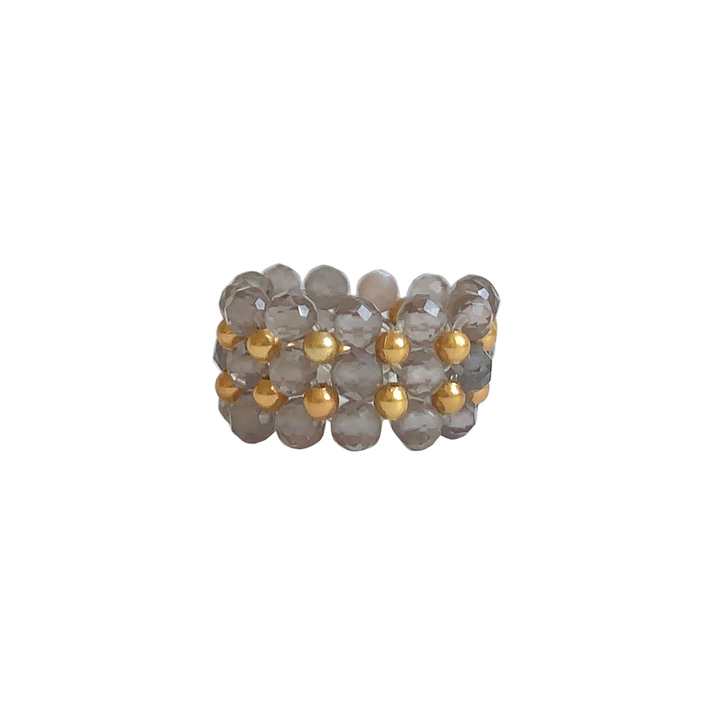 One of a kind stretch ring by IBU. Fully Handmade and woven with such delicacy from small gold plated beads and multi smoky quartz stones. This fashion ring can be worn alone or stack it with our other rings.