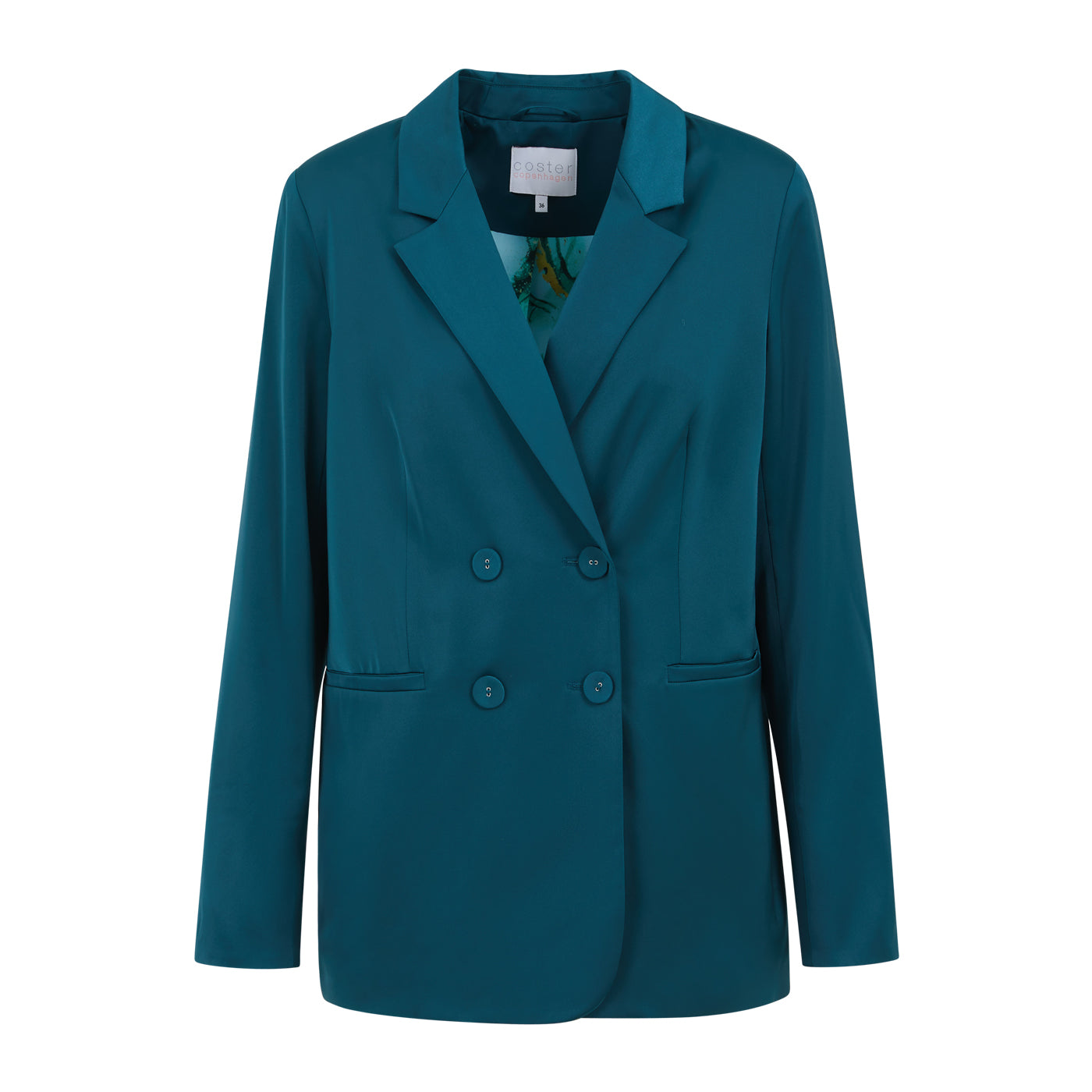 Indulge in the luxurious quality of our coveted Scandi brand Coster Copenhagen's relaxed blazer. Its oversized, double-breasted design exudes effortless cool, making it a versatile choice for both casual and formal occasions. Elevate your style game by pairing it with jeans or a dress for an exclusive touch.