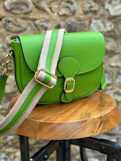 Leather saddle bag with contrast leather and woven belt