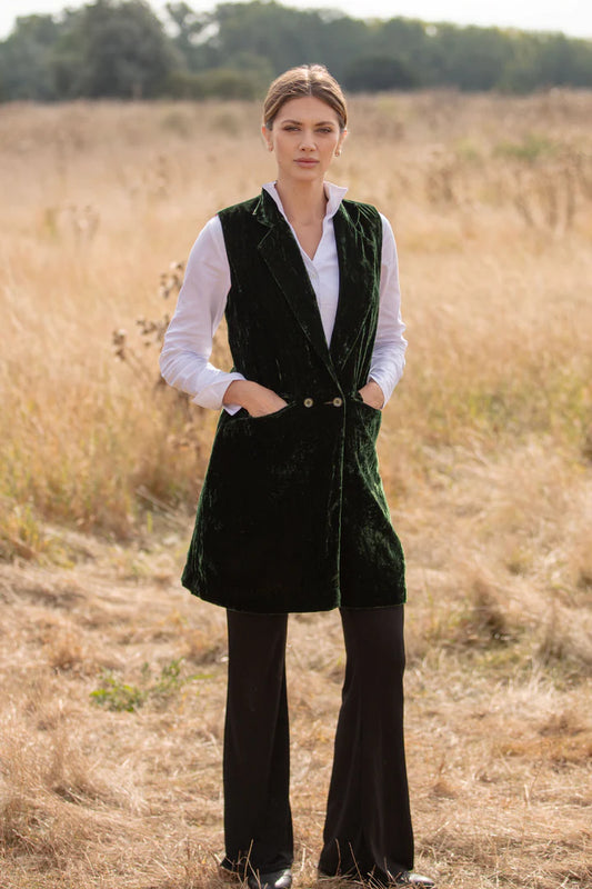 Our stunning long silk velvet waistcoat by At Last has a smart tailored collar, straight hem with a vent opening at the back and front pockets.&nbsp; Super versatile, wear casually or more formally, dress up or down… great for smart casual.