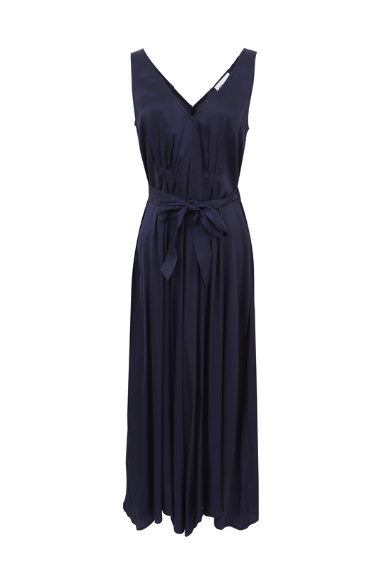 A stunning slip style dress by FRNCH in a super soft silky feel fabric. The V front and back is super flattering . The dress is slightly fitted under the bust and has a full skirt. There is a fabric belt to tie and side pockets. A great piece for an occasion. The fit is true to size.
