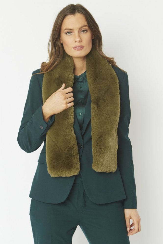 A super soft faux fur scarf by JAYLEY. A great simple piece for the colder months to wear with a coat or jacket . With a small slit on one side the end can be threaded through in a cross shape for a snug feel. Wear loose if you prefer. Great for gifting.