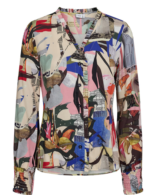 A beautiful abstract print blouse form Scandi brand NUMPH in an array of great colours. A long sleeved blouse with gathered cuffs. The V neck has a small frill trim in the same fabric. There are five flower shaped contrasting buttons to fasten at the front. The blouse is semi fitted with darts at the front to add shape. The fit is true to size.