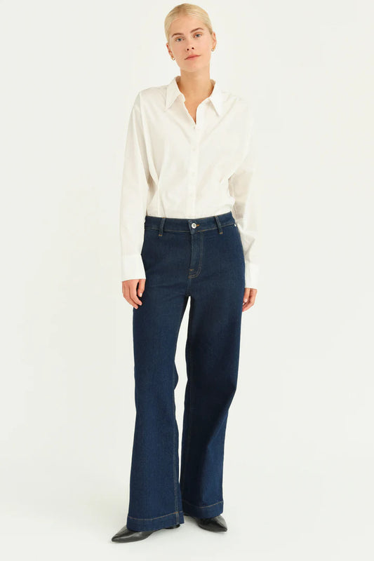 Our Gilly wide jean from Danish brand PIESZAC comes with a high waist, loose fit and wide legs. This fit will draw attention to and flatter the area between your shoulders and hips effortlessly. They are fantastic for elongating the silhouette. A High rise wide leg jean with slanted pockets at the front and patch pockets at the back. A zip front with a single button to fasten. A great all rounder.