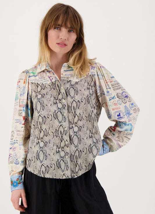 Western style mixed print shirt with collar from ME369 . Long sleeves and cuffs. Prints are quirky combinations of print and colour. That special piece for any season with the WOW factor even worn simply with jeans.