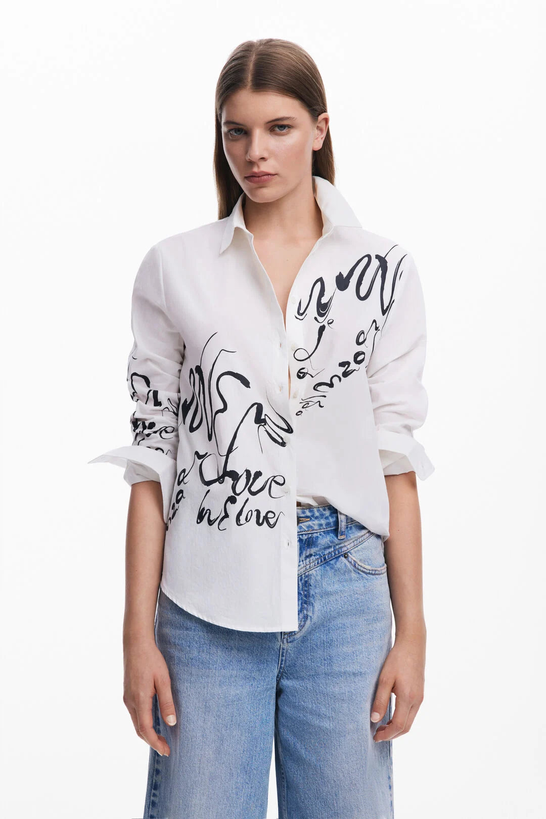 The Hera monochrome shirt from Spanish brand DESIGUAL is a great wardrobe piece for all year round. A classic shaped white shirt with a difference thanks to the fabulous Spanish styling. Long sleeves with a classic cuff with single button. The fit is true to size.