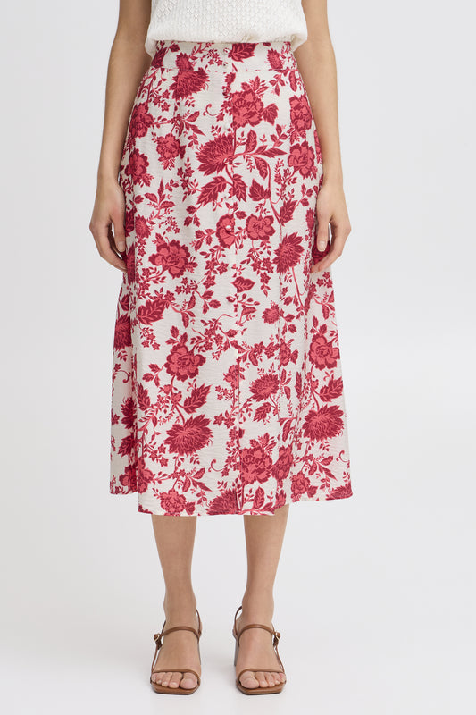 The FRHita skirt from Scandi brand FRANSA is in a beautifully bright summer print . With a half elasticated waist this A shape skirt sits mid calf. There are buttons down the front to a small split. The buttons do not open as there is a side zip and button fastening. The fit is true to size.