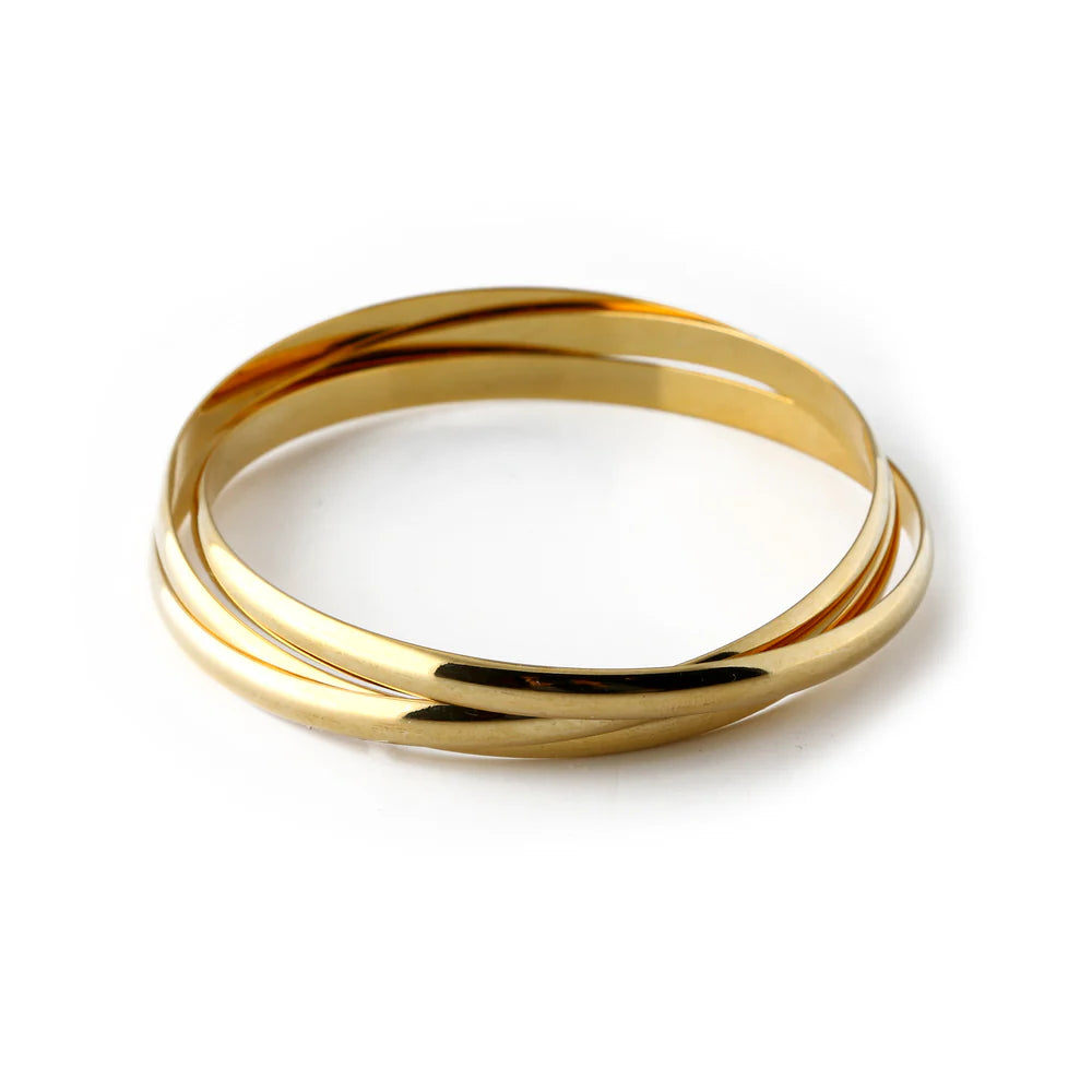 We've adapted our bestselling interlocking rings from ORELIA LONDON into a matching bangle. These Interlocking Bangles in gold or silver can be easily thrown on for an on-trend layered wristwear look. Featuring three clean gold or silver rings in the form of an easy to wear bangle. Pair with our favourite Interlocking Rings in Gold to complete the look.