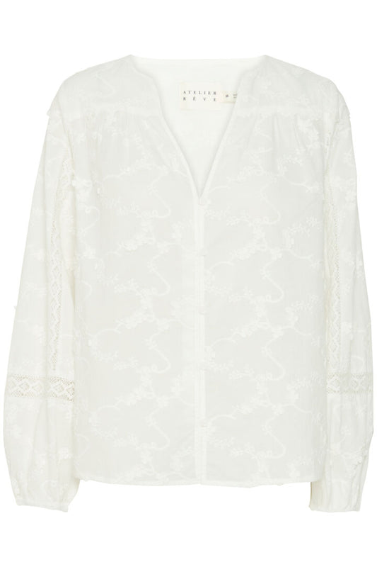 The prettiest blouse for the summer from Parisienne brand Atelier Reve !&nbsp; With pretty embroidery and layering detail on the sleeve this blouse will be your go-to for the summer. The V neck top has button fastening from the bottom of the V to the hem. This is typical of Atelier Reve styling with a super feminine twist.