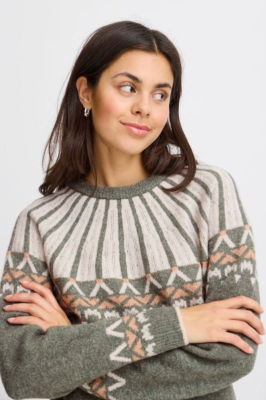 A stunning cosy knit from Scandi brand FRANSA in a cool green colour with accents of neutrals.. This on trend piece is a great Winter warmer to add to any capsule wardrobe. Wear with jeans or a lovely Winter white cord and a chunky boot for maximum comfort and style. The fit is generous.