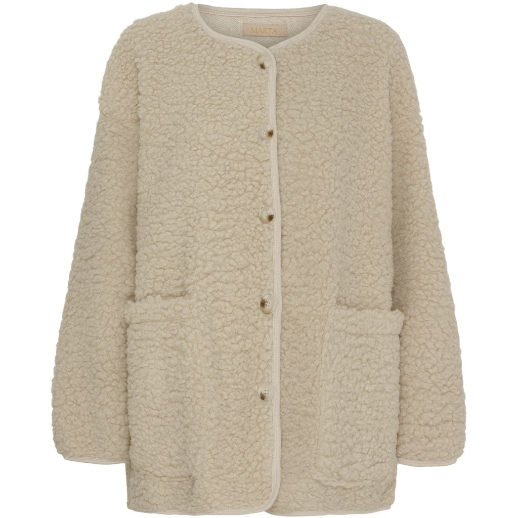 The Lucile jacket from French brand Marta Du Chateau is perfect as a throw over piece all year round. The soft teddy style fabric makes it a super piece for now. The sizing is really generous for a one size piece. It will fit up to about a size 18 easily. Not a great size for a smaller person.