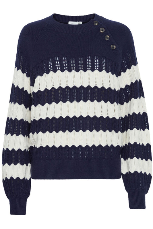 This beautiful piece from Parisian brand ATELIERE REVE in classic navy and off white. A gorgeous textured knit in a cool stripe. A great jumper for those of us who are unable to wear wool, soft as butter to the touch. The long sleeves have a ribbed cuff. The round neck is also ribbed and there are buttons diagonally placed at the neck on one side. The fit is generous.