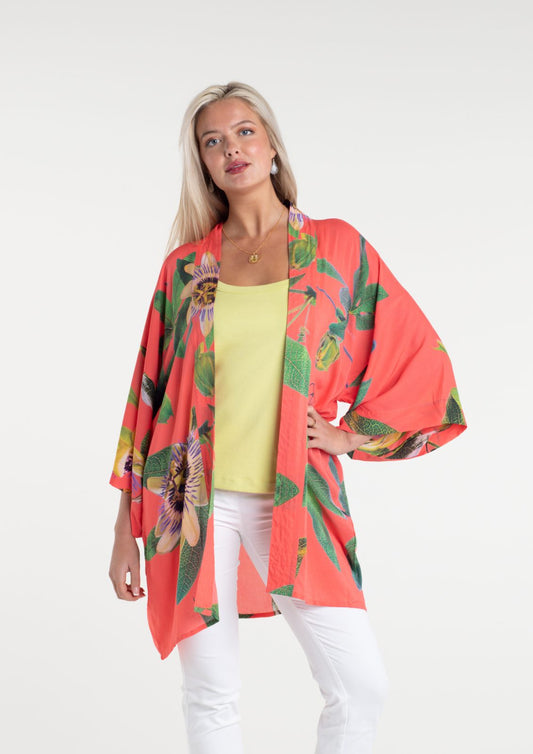 The lightweight mid-length kimono jacket comes in a beautiful floral&nbsp;Passionflower&nbsp;print in Coral. From the wearable art clothing label, From My Mother’s Garden, the lightweight mid length kimono can be worn both casually as a smart coverup.