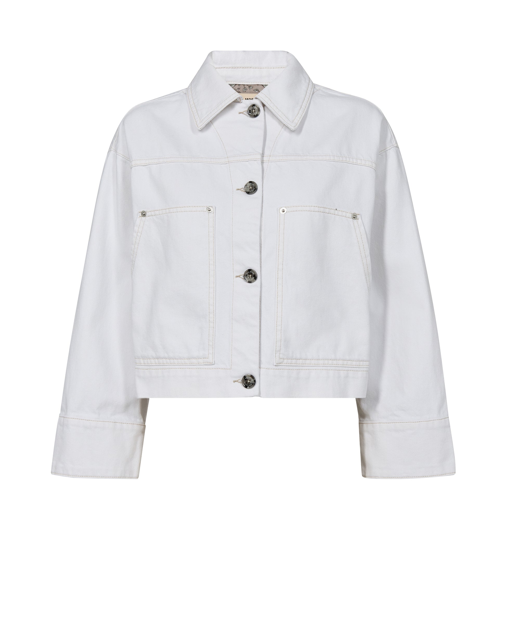 A super stylish white boxy denim style jacket from Scandi brand MOS MOSH . With a shirt style collar and contrasting buttons to fasten this jacket has that point of difference. It has a three quarter sleeve with a wide cuff which is lined with a quirky lining. There are large patch pockets at the front and a half elasticated waist at the back for a great fit.