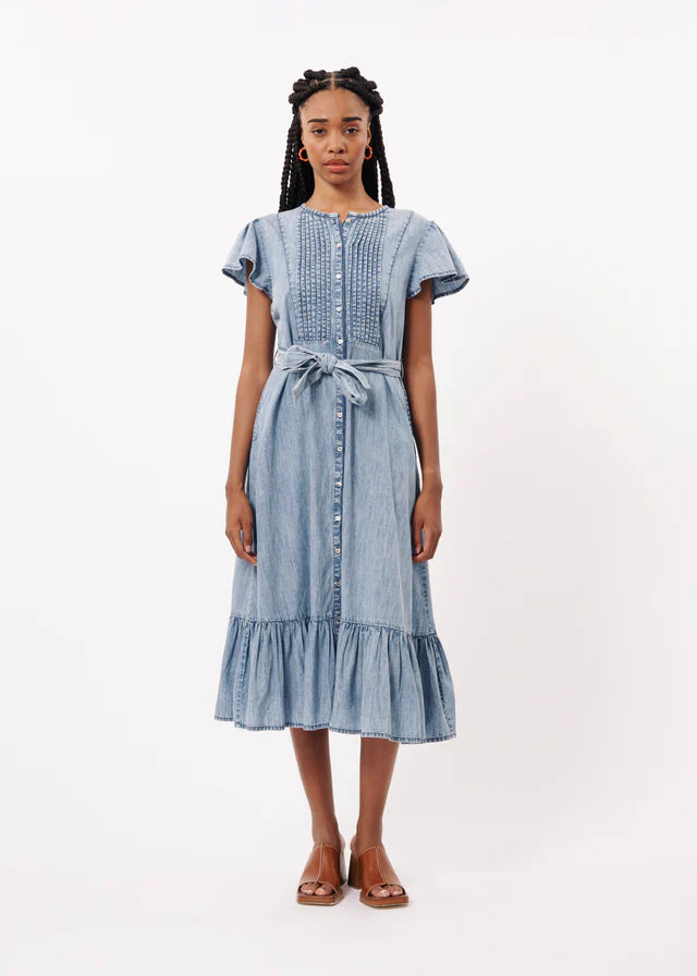 The Nolene Dress from French brand FRNCH is effortlessly chic. With cap sleeves and pin tucks on the bust to flatter this dress is a summer staple. The fit is true to size.