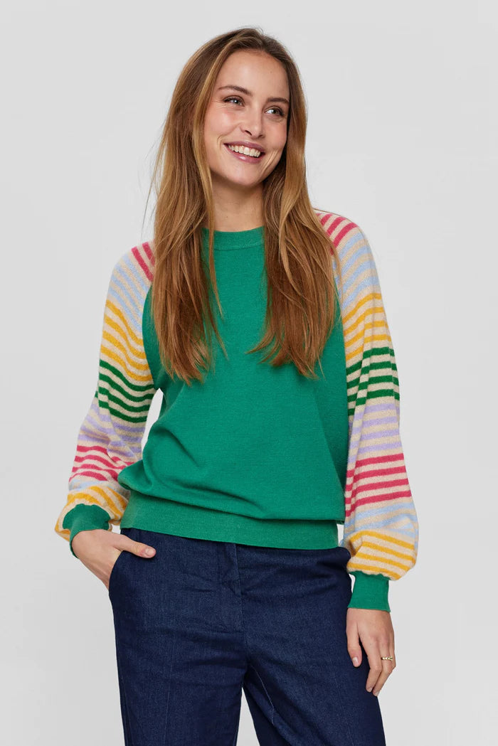 We are loving this colourful piece from Scandi brand Numph which is in the new Spring/Summer collection. The round neck long sleeved knit is in a fabulous combo of bright colours. The body is in a bright green and the sleeves in a multi coloured contrasting stripe.