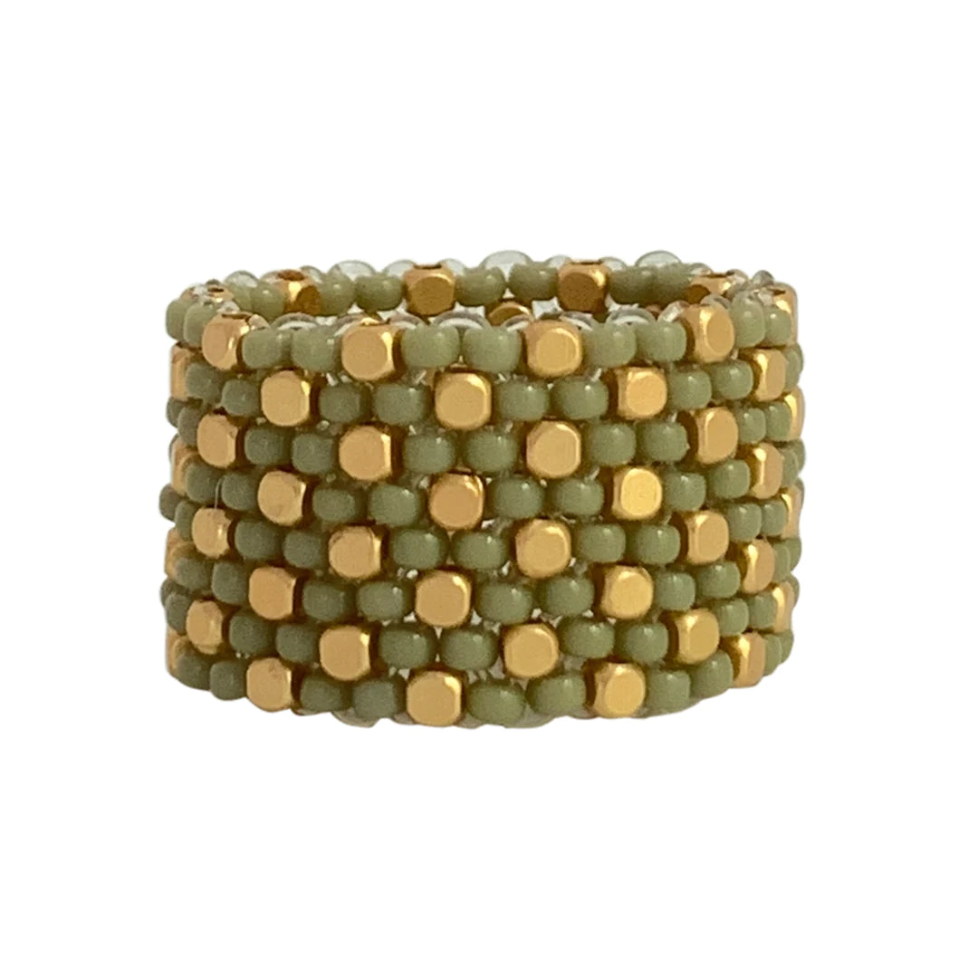 One of a kind stretch ring. Fully Handmade and woven with such delicacy from small (gold plated) beads. This fashion ring can be worn alone or stack it with our other rings.
