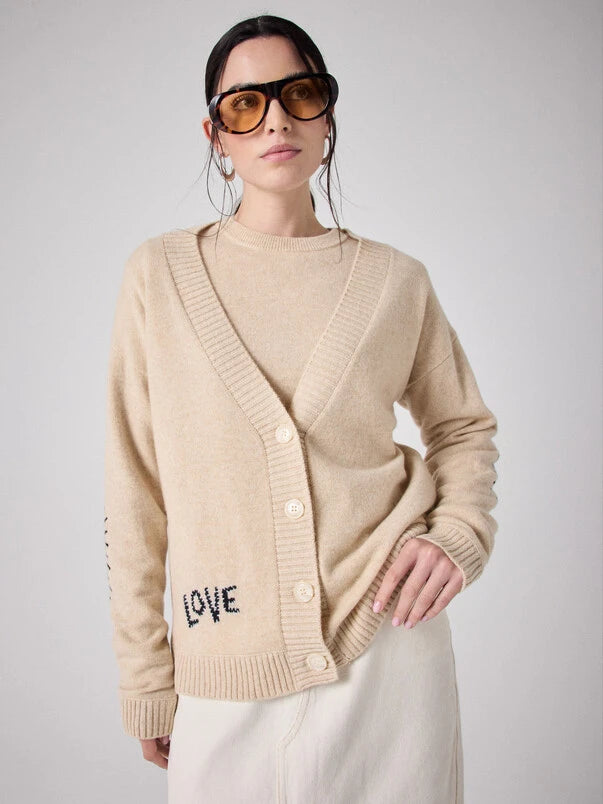 luxurious cashmere at its best from France. Long sleeved V neck cardigan.