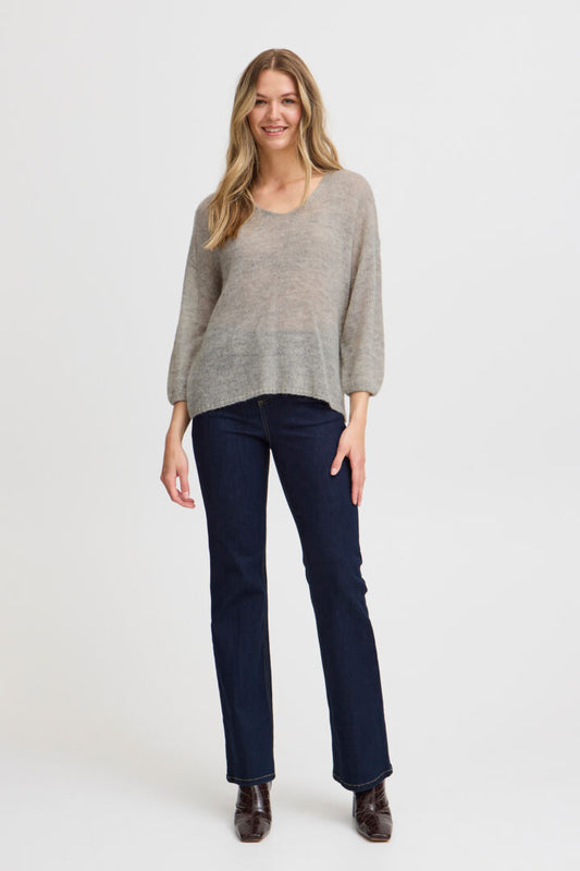 This very fine jumper from Danish brand FRANSA is super light and perfect for the transition to Autumn. A simple V neck with a three quarter sleeve which can be worn over a camisole for extra warmth. The fit is boxy.