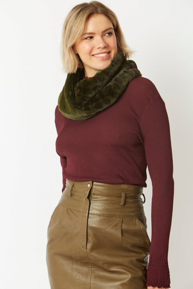 A beautiful rich coloured snood in half plain half animal print fabric from JAYLEY. In an infinity shape it fits gently over the head to sit beautifully under a coat or jacket. You can alternatively wear as a collar over a chunky knit for a classic look