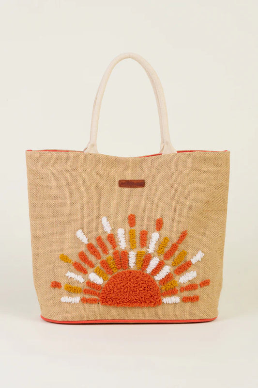 Keep the good weather close to hand with the Brakeburn Sunshine Beach Bag. A woven jute shoulder bag with a fun, textured embroidered design, the Sunshine beach bag is perfect for beach trips, swimming or laid back summer living.