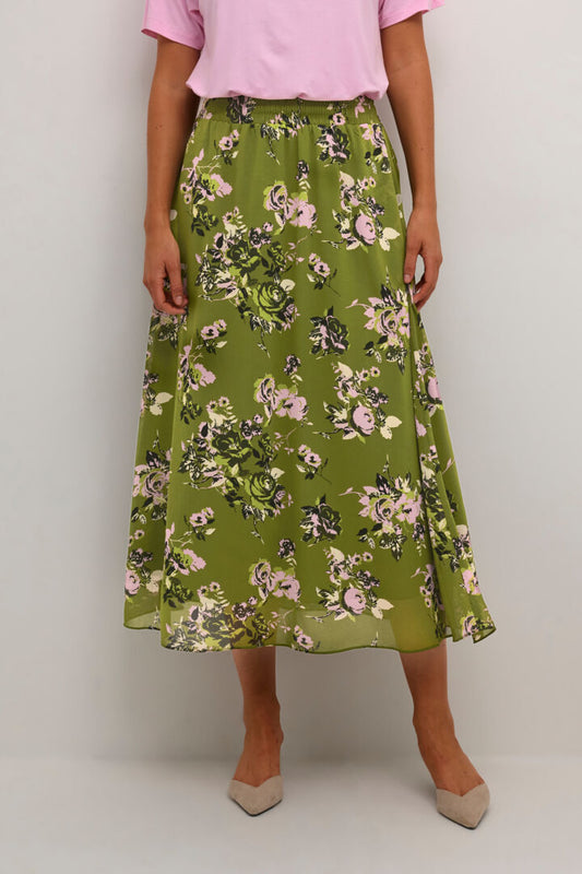 An exquisite pull on skirt from Kaffe clothing featuring a lovely floral print. The elastic waistband guarantees a perfect fit. With a flared design and side pockets, this longer length skirt is fully lined and true to size.