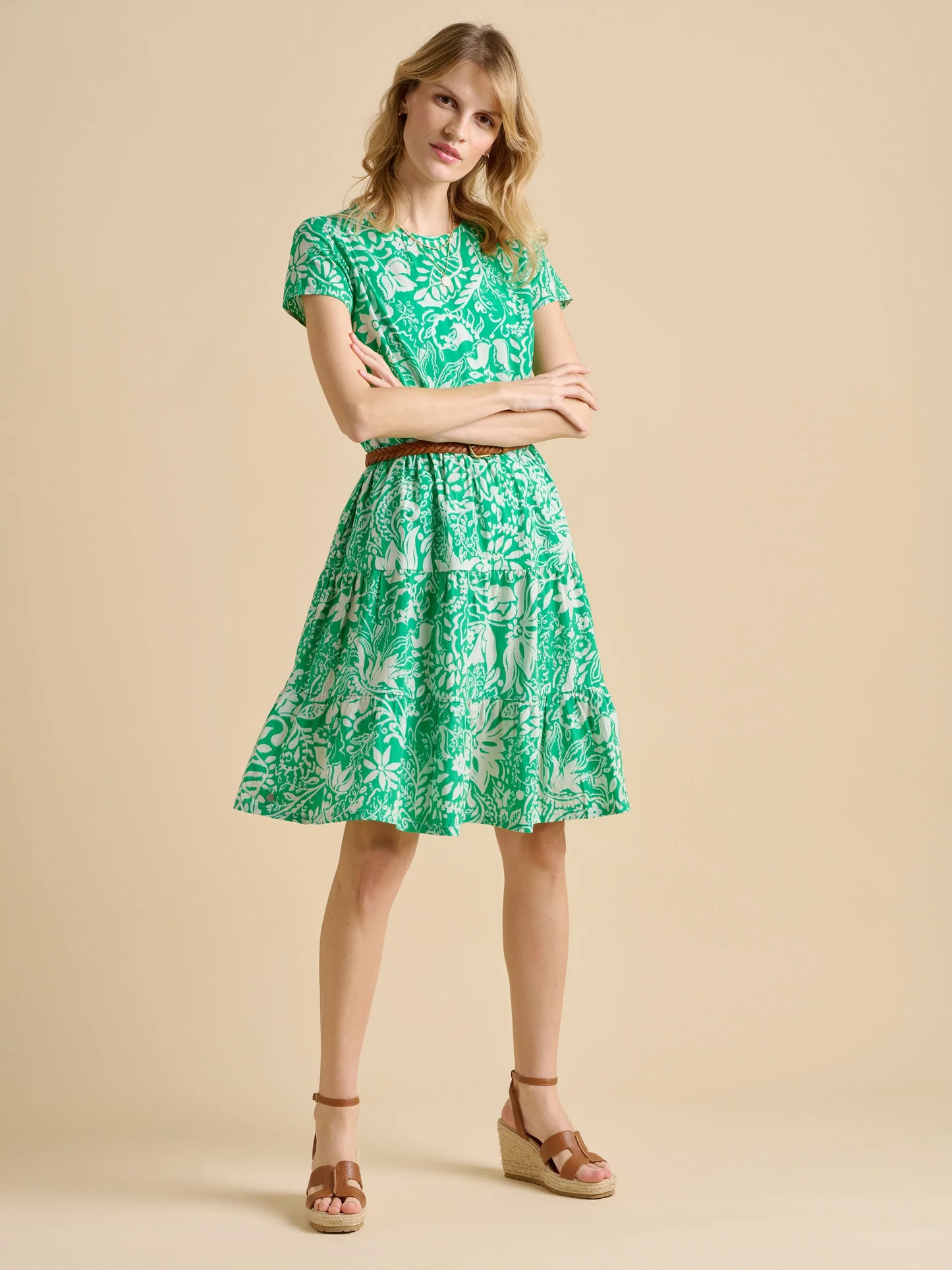 You’ll be reaching for this dress from BRAKEBURN on those hot summer days. The lightweight, vibrant fabric is complimented with a breezy, loose fit, ideal for enjoying a stroll in nature or heading to a garden party. Pair with flip flops and brown sunglasses.