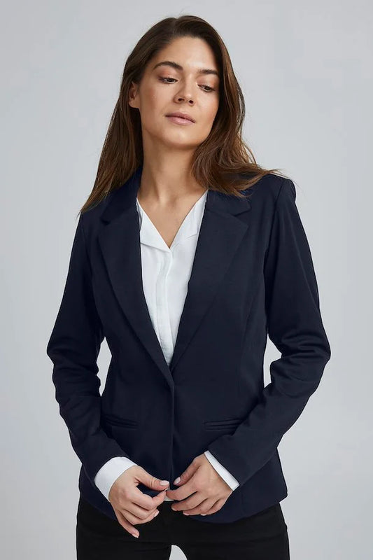 Elevate your wardrobe with this eye-catching long sleeved stretch blazer by renowned Scandi brand Fransa. Bold and vibrant in colour, this blazer is the ultimate statement piece. Its sleek silhouette is accentuated by a single button fastener and elegant lapels. Although it features faux pockets on the front. Keep in mind that it runs small, so you may want to size up for a perfect fit.
