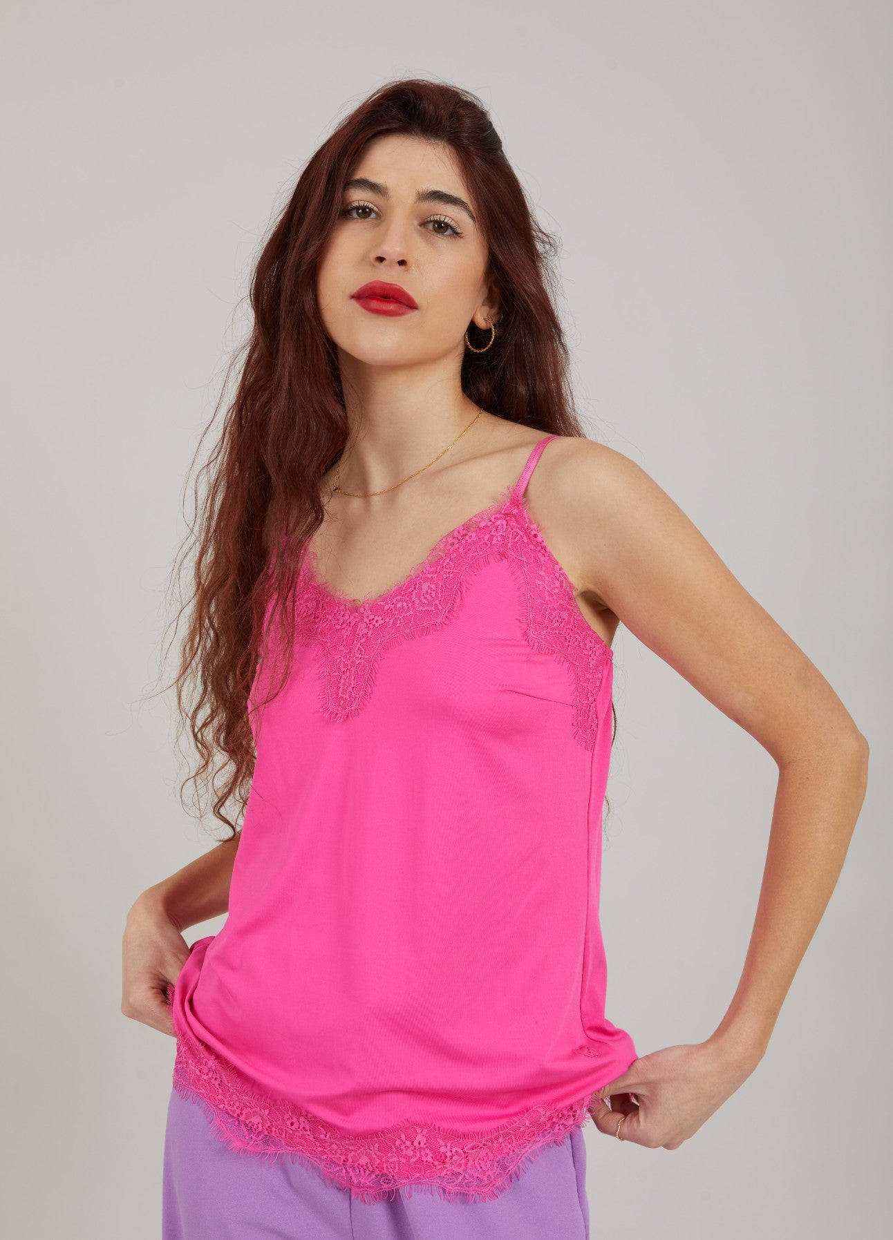 This gorgeous and feminine silky feel camisole from Scandi brand CC Heart is great staple for all year round. It has stretch and adjustable straps for the perfect fit. It has delicate lace on the neckline and also on the hem to add that touch of glam. Slip this under a blazer or under a wrap dress or under a boxy knit. It is a polyester and elastane mix so is super easy to wear.