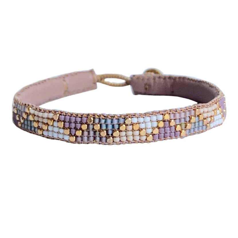 Simple yet elegant bracelet made out of a mix of soft different Summer colours linked together to provide a beautiful accent.